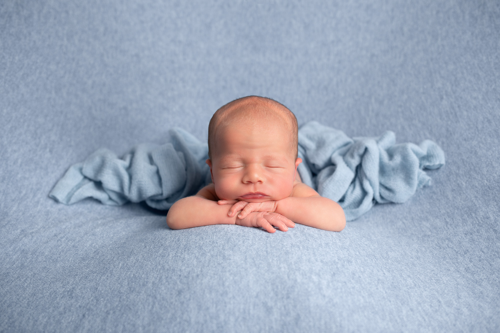 newborn baby boy blue photoshoot