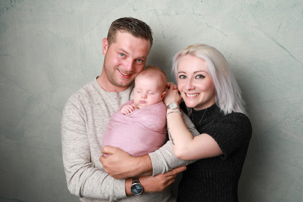 family portrait with newborn baby girl 