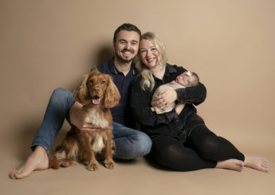 Family Portrait Photoshoot Peekaboo Liverpool young family with newborn baby and dog