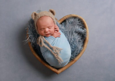 Newborn photoshoot Peekaboo Liverpool baby blue and neutral heart
