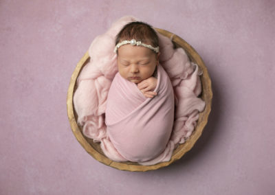 Newborn photoshoot Peekaboo Liverpool baby pink bowl