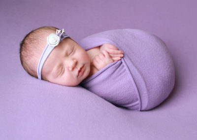 Newborn photoshoot Peekaboo Liverpool lilac wrap