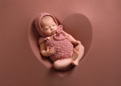 Newborn photoshoot Peekaboo Liverpool dusty pink outfit & bonnet in heart