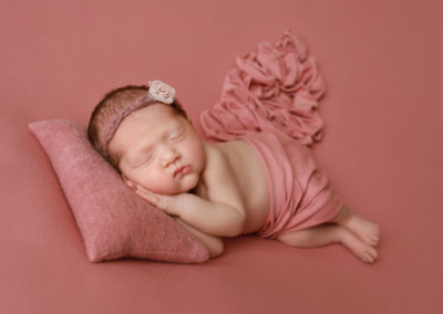 Newborn photoshoot Peekaboo Liverpool dusty pink pillow
