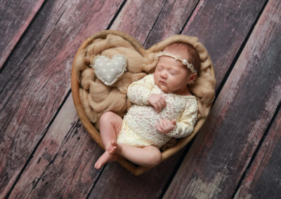 Newborn photoshoot Peekaboo Liverpool brown and neutral heart bowl