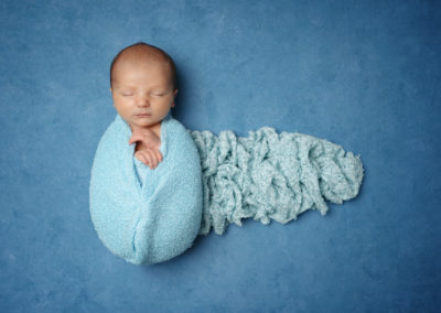 Newborn photoshoot Peekaboo Liverpool blue tones