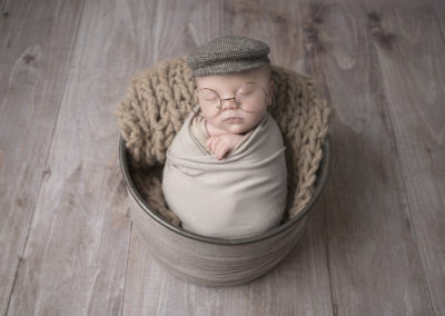 Newborn photoshoot Peekaboo Liverpool baby flat cap and glasses