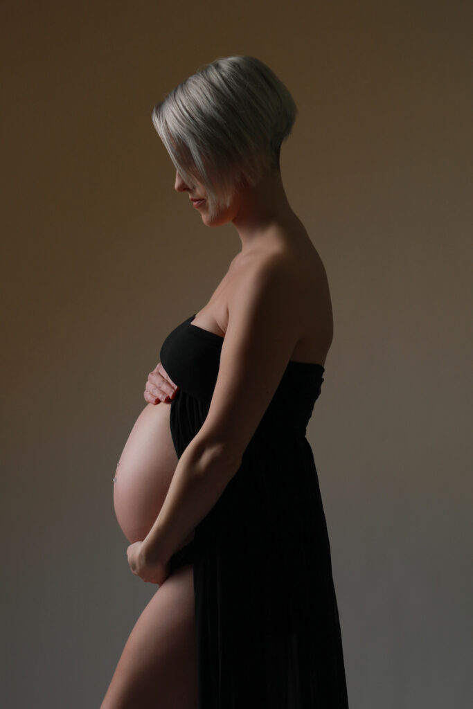 picture of pregnant woman in maternity gown 